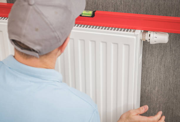 istock Heating Radiator Installation with Spirit Level Tool 1312761536