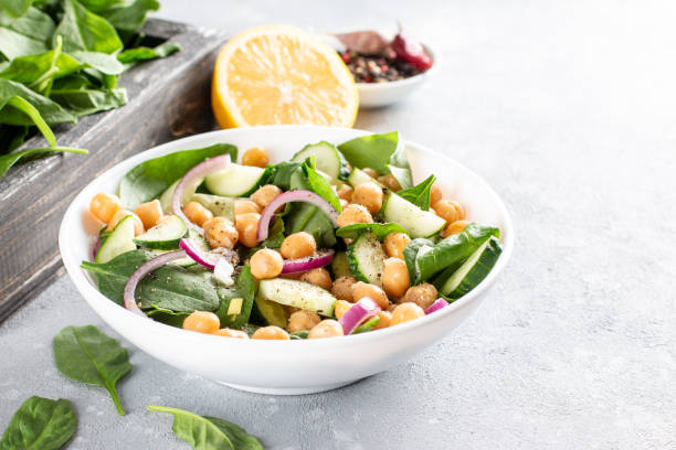 istock Vegetable salad with chickpeas in a plate. Dietary food. Copy space. 1312763727