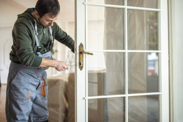 istock Repairman working on repairing doors 1312763792