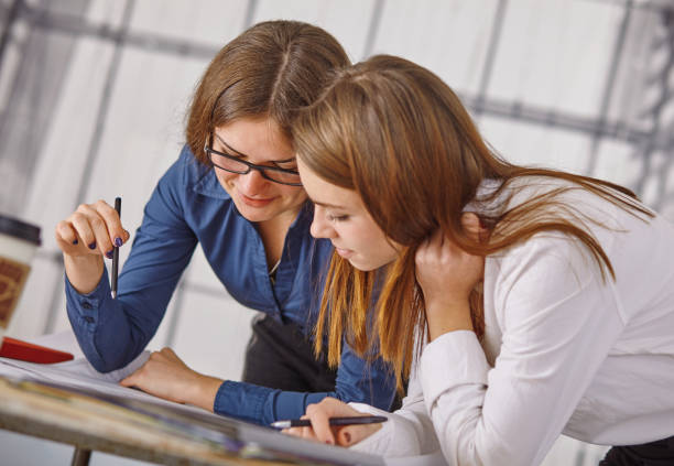 istock Image of business partners discussing documents and ideas at meeting 1312765957