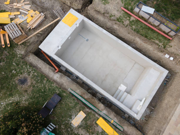 istock aerial drone shot of pool construction site almost finished spackling 1312766428