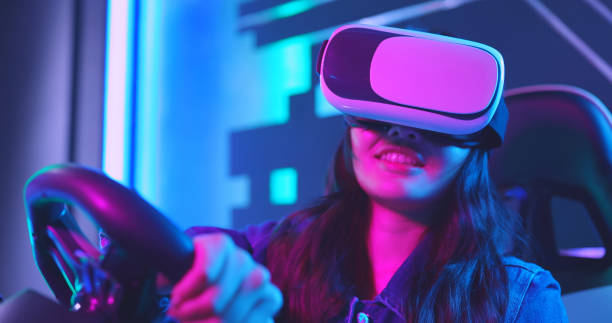 istock woman play 3D vr game 1312767488