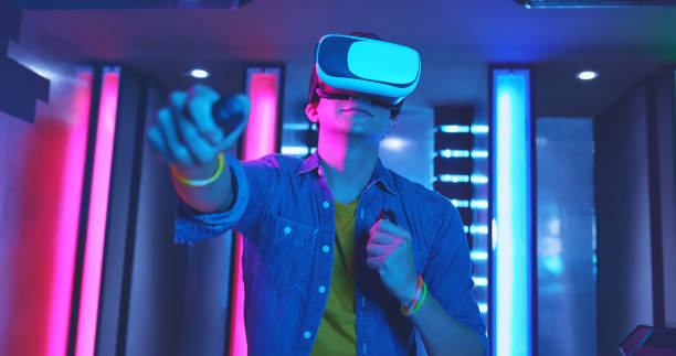 istock asian man wear vr glasses 1312767778