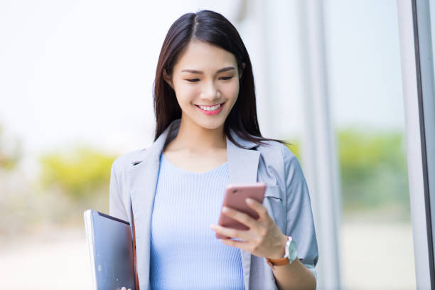 istock businesswoman use smart phone 1312768699