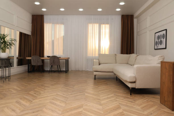 Modern living room with parquet flooring and stylish furniture Modern living room with parquet flooring and stylish furniture Linoleum flooring stock pictures, royalty-free photos & images