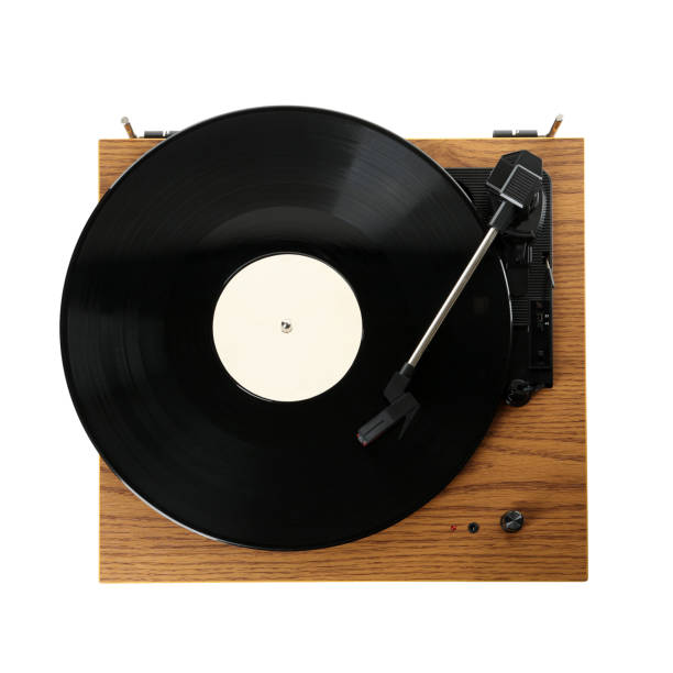 istock Modern turntable with vinyl record isolated on white, top view 1312770193