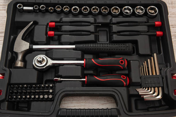 istock new set of wrenches and bits in tool box on wooden desk 1312772553