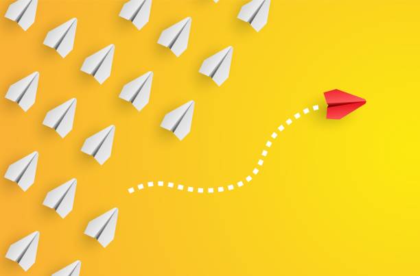 istock Individuality concept. Individual and unique leader red paper plane flies to the side. Think different. Vector 1312772837