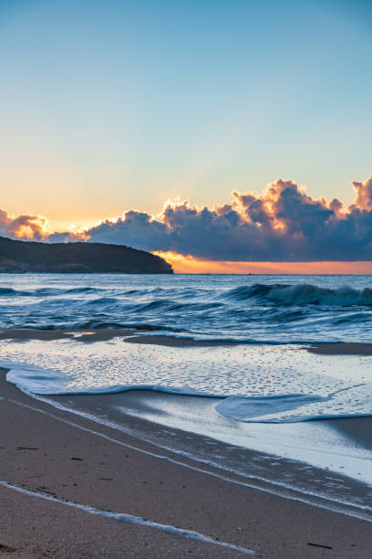 istock Sunrise at the seaside with low cloud bank 1312773074