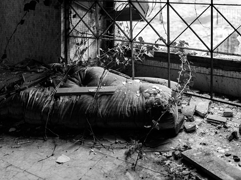 Old mattress in abandoned mental hospital