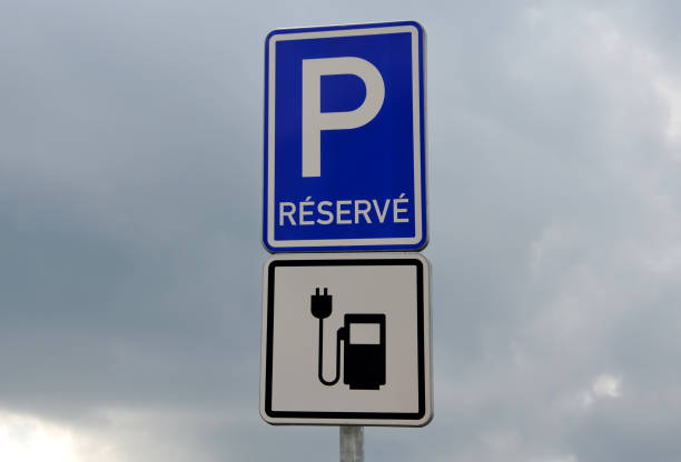 istock Charging station with petrol stand symbol with cable and plug 1312779909