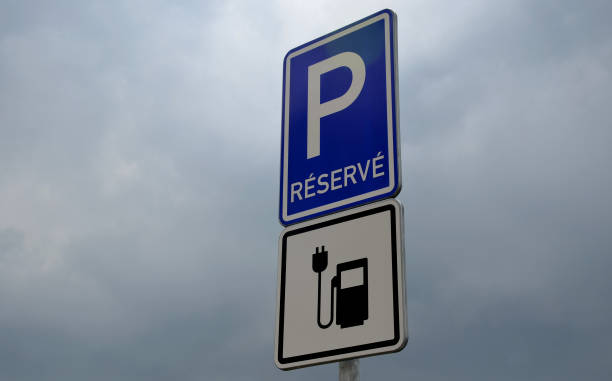 istock Charging station with petrol stand symbol with cable and plug 1312780233