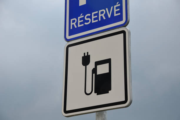 istock Charging station with petrol stand symbol with cable and plug 1312780237