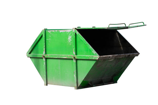 istock green dumpster isolate on white background, industry steel bin on white background 1312780290