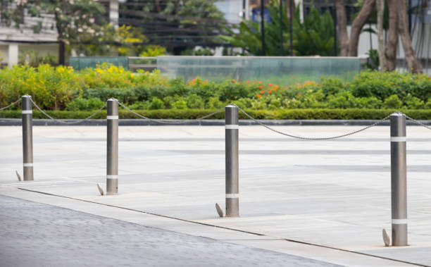 istock stainless steel bollards with steel chain. 1312780291