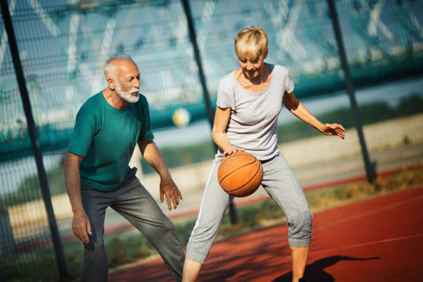 istock Seniors playing basketball. 1312781642