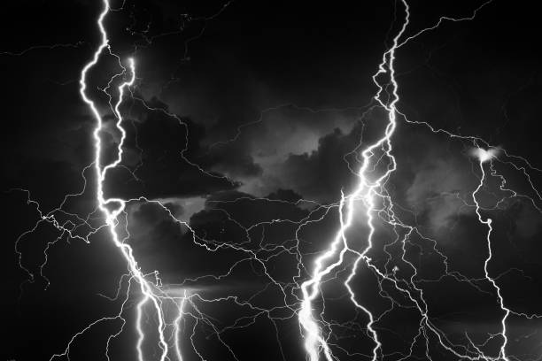 Lightnings during summer storm at night stock photo