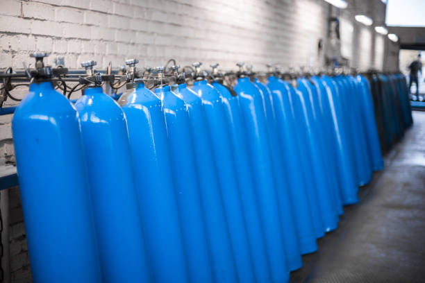 Oxygen cylinder with compressed gas. Blue Oxygen tanks for industry. Liquefied oxygen production. Factory