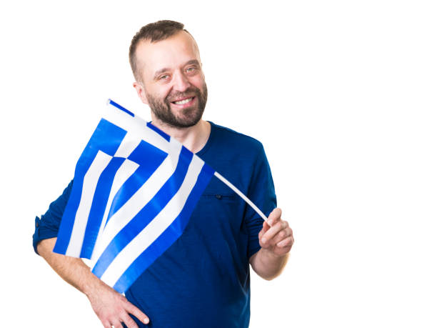istock Man with greek waving flag, on white 1312783004