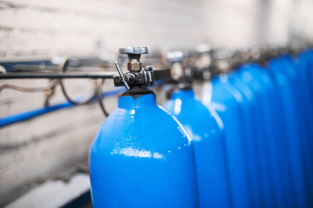 istock Oxygen cylinder with compressed gas. Blue Oxygen tanks for industry. Liquefied oxygen production. Factory 1312783008