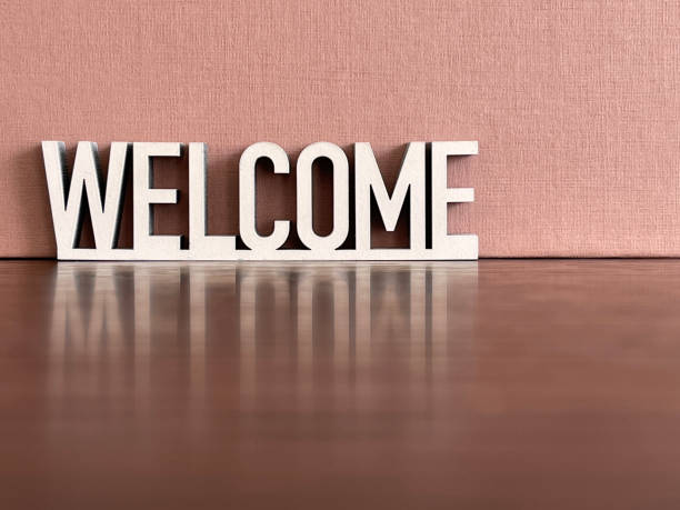 istock Welcome sign on brown beige background 1312783805