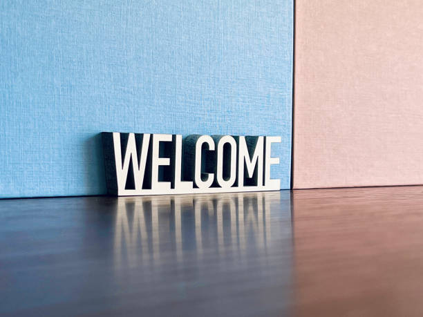istock Welcome sign on blue beige background 1312783880
