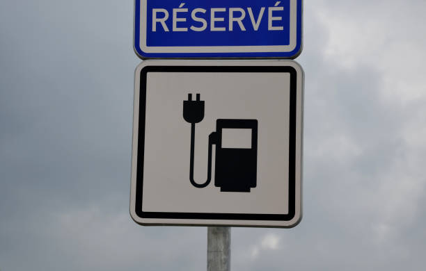 istock Charging station with petrol stand symbol with cable and plug 1312784141