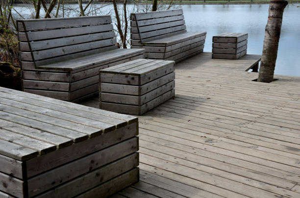 istock floating walkway made of wood planks. 1312784177
