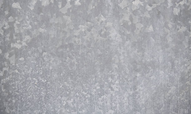 Galvanized metal background Close-up of a galvanized steel panel. galvanized stock pictures, royalty-free photos & images