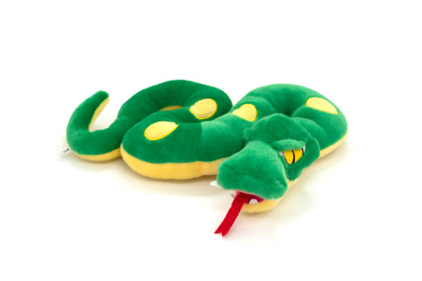 istock Funny soft snake toy isolated on white background. 1312792544