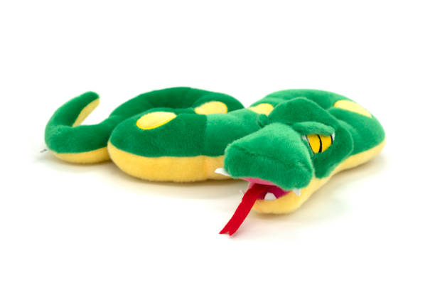 istock Funny soft snake toy isolated on white background. 1312793354