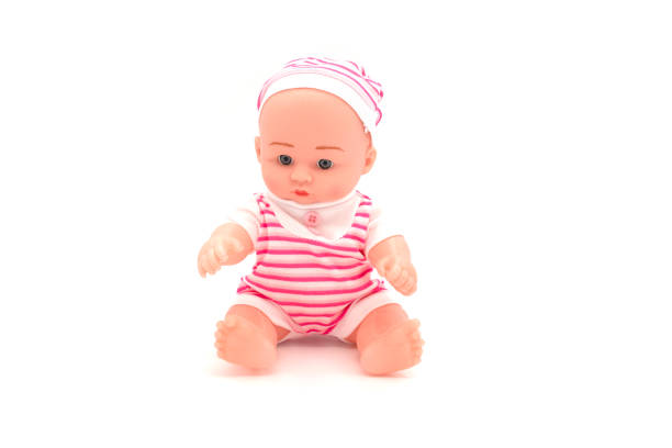 istock New born doll isolated on white background. 1312793779