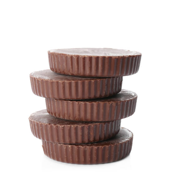 istock Delicious peanut butter cups on white background 1312794977