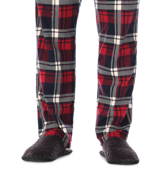 istock Man in warm soft slippers on white background, closeup 1312795121