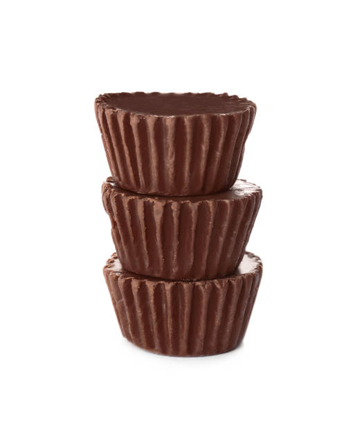istock Sweet peanut butter cups isolated on white 1312795636