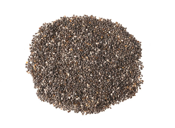istock black chia seeds isolated on white background with clipping path, Top view. 1312798120