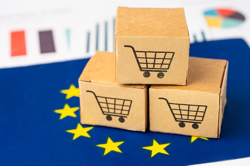 Box with shopping cart logo and EU flag, Import Export Shopping online or eCommerce finance delivery service store product shipping, trade, supplier concept.
