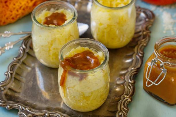 istock Sweet creamy rice pudding with caramel sauce toffee 1312799729