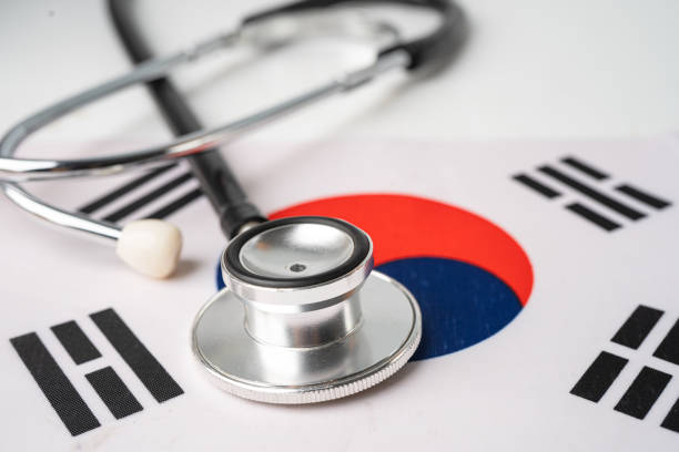 istock Stethoscope on Korea flag, check problem of business and finance concept. 1312801160