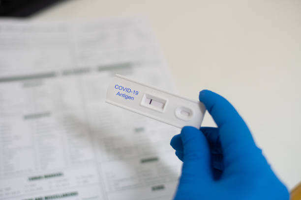 istock Strip Screening rapid test COVID-19 antigen negative.Testing in biosafty cabinet class 3. 1312801918