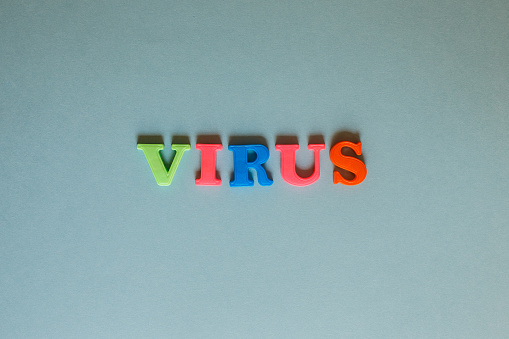 the word virus on a blue background