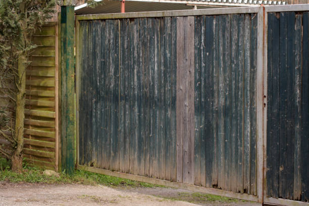 istock Old wooden gate on a farm 1312802966