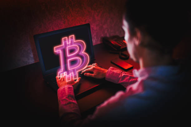 istock Unrecognizable person using his laptop to trade Bitcoin. Bitcoin / Cryptocurrency concept. 1312803145