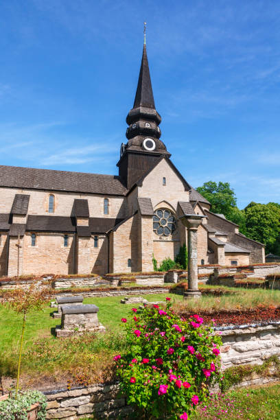 istock Varnhem abbey in Sweden with red roses 1312804350
