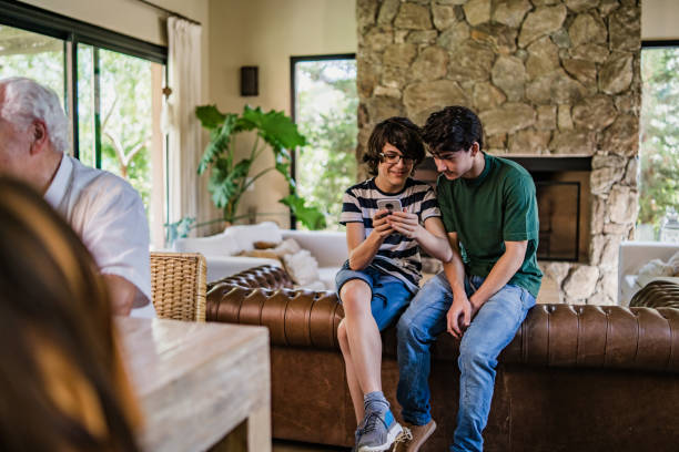 istock Teenagers playing on a smart phone 1312805800