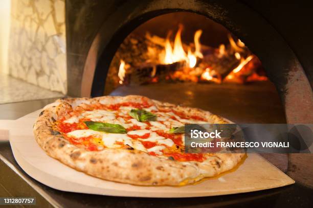 Real Neapolitan Italian Pizza Called Margherita Pizza Just Out Of The Oven Stock Photo - Download Image Now