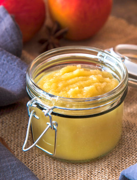 istock Fresh homemade apple sauce in a jar 1312812046