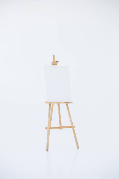 istock advertising stand or flip chart or blank artist easel isolated on white 1312813317