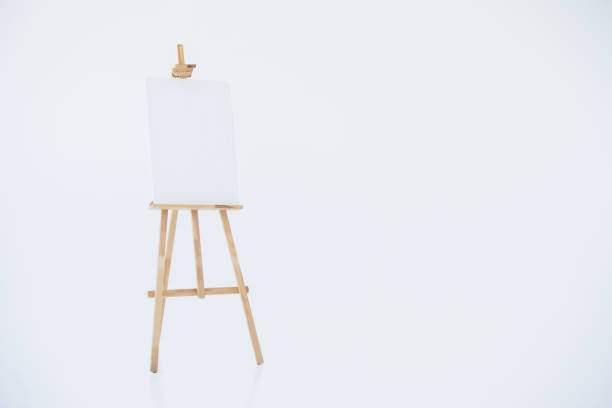 istock advertising stand or flip chart or blank artist easel isolated on white. 1312813462