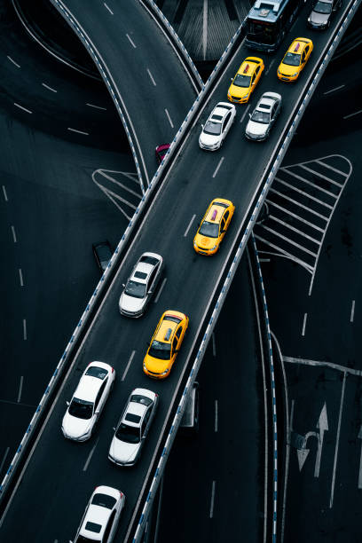 istock Aerial View of Complex Overpass and Busy Traffic 1312815756